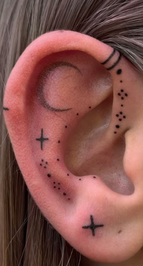 Stick And Poke Ear Tattoo, Ear Tattoo Piercing, Stars Ear Tattoo, Goth Ear Tattoo, Subtle Face Tattoos, Tattoo Ideas Female Ear, Star Ear Tattoo, Moon Ear Tattoo, Earlobe Tattoo