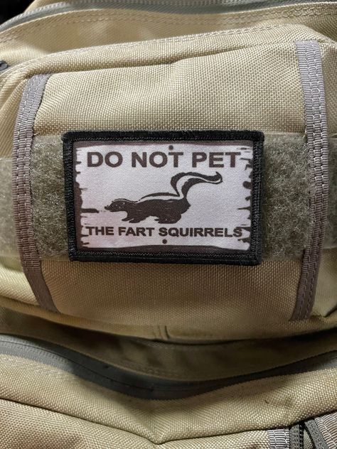 Do Not Pet The Fart Squirrels Morale Patch  2x3  hook and loop Patch! Our Morale Patches are custom made. They are NOT embroidered which means the artwork will never fade or come unraveled! -Unlimited colors -Hi Res Images! -Awesome Photo quality detail -No threads to fray -Clean look without connecting threads between words -Durable because image is permanently dyed into the patch -Feel free to wash them off if they get dirty! -Photographs can be reproduced - not possible with embroidery -Smooth gradients can be reproduced - not possible with embroidery FREE SHIPPING IN THE USA! Morale Patch Display, Funny Patches, Connecting Threads, Morale Patches, Custom Patch, Military Quotes, Tactical Gear Loadout, Tactical Patches, Patches Shirt