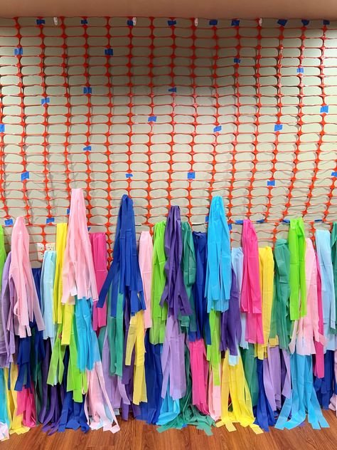 DIY COLORFUL TASSEL FRINGE STREAMER PHOTO BOOTH BACKDROP Homemade Backdrop Ideas, Fringe Pencil Backdrop, Parade Float Fringe Diy, Tapestry Photo Backdrop, Streamers Doorway Entrance, Game Day Photo Backdrop, Cheap Party Backdrop, Tassle Backdrop Photo Booths, Fringe Arch Backdrop