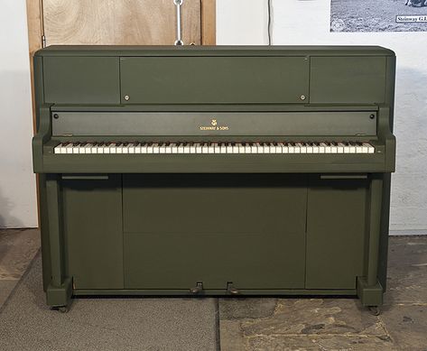 A 1945, Steinway 'Victory Vertical' G.I. upright piano for sale with an olive drab case £20,000. This upright was airdropped onto battlefields during WWII for the American troops. Piano has an eighty-eight note keyboard and three pedals. Black Upright Piano, Steinway Upright Piano, Lego Grand Piano, Antique Upright Piano, Sheet Music With Letters, Piano Restoration, Black Grand Piano, Steinway Piano, Piano For Sale