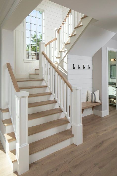 A Nantucket coastal style retreat with breathtaking Lake Minnetonka views White Stairway Ideas, White Spindle Staircase, Coastal Railing, Coastal Staircase Ideas, Farmhouse Stair Railing Ideas, Modern Home Stairs, Staircase With Windows, White Balusters, Beach House Staircase