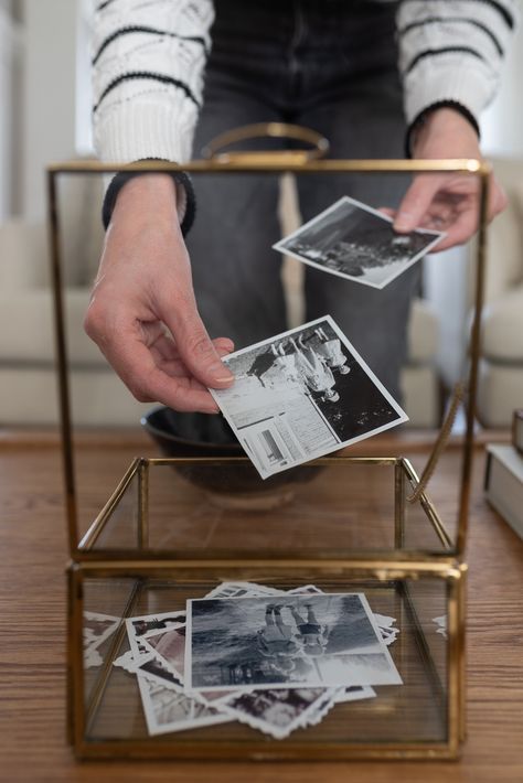 Creative Ways to Display Family Photos in Your Home - Nick + Alicia Where To Put Photos In House, Antique Photo Wall Display, Storage Picture Frame, Framing Photos Ideas, Displaying Photos In Living Room, Display Family Heirlooms, Where To Put Family Photos In House, Polaroid Photo Display Ideas, Curated Gallery Wall