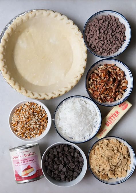 I Tried “Texas Trash Pie” and It’s the Easiest Last-Minute Dessert | The Kitchn Texas Trash Pie Recipe, Texas Trash Pie, Trash Pie, Texas Trash, Pie Crust From Scratch, Sweet Condensed Milk, Frozen Pie Crust, Frozen Pie, Soft Caramel