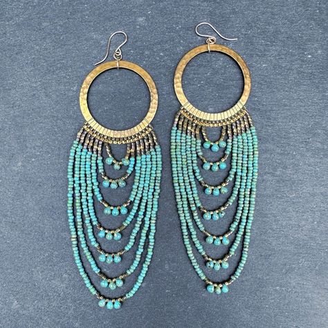 These gorgeous beaded hoop statement earrings were handwoven and strung one bead at a time with Miyuki glass seed beads. The beaded looped fringe earrings feel wonderful with their gentle weight and delicate swing. Almost 5" long!  Handwoven Brick Beadwork Miyuki delica 24k gold plated seed beads Miyuki Round Glass Seed Beads Miyuki Glass Drop Beads  Hammered raw brass hoops - 35mm Extra durable nylon beading thread Size: 4 3/4" long (from ear wire), 1 1/2" wide Weight: 6g/each (12g/pair) Long Bead Earrings, Seed Bead Fringe Hoop Earrings, Loop Beaded Earrings, Beaded Hoop Earrings Patterns, Fringe Hoop Earrings, Hoop Earrings Diy, Diy Jewellery Designs, Seed Bead Jewelry Patterns, Beading Thread