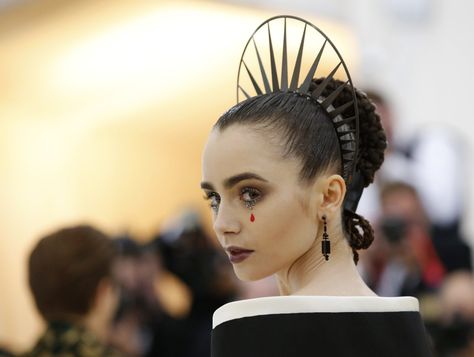 Lily Collins in Givenchy  at Met Gala '18 Catholic Fashion, Heavenly Bodies, Black Sheer Dress, Met Ball, Amal Clooney, 90's Fashion, Head Piece, Lily Collins, The Red Carpet