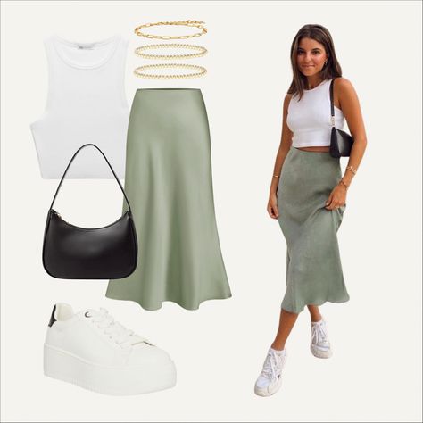 Girl wearing a sage green, satin midi skirt, white tank, black purse, platform sneakers & gold jewelry Silk Green Skirt, Sage Green Silk Skirt Outfit, Mint Satin Skirt Outfit, Sage Green Satin Skirt, Silk Satin Midi Skirt Outfit, Silk Midi Skirt Outfit Spring, Long Satin Skirt Outfit Summer, Long Green Skirt Outfit Ideas, Sage Green Satin Skirt Outfit