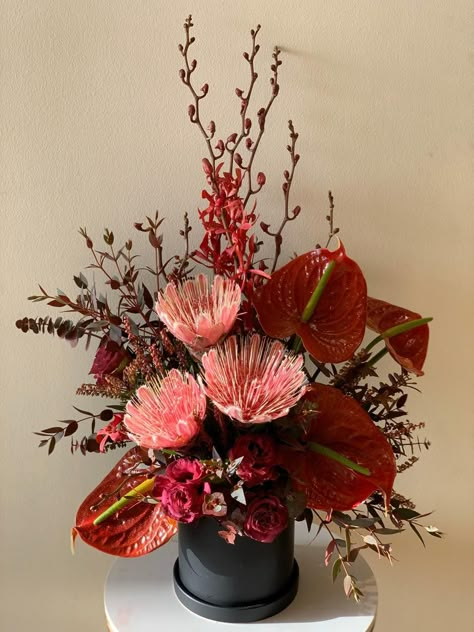 Red Flower Arrangements Modern, Edgy Floral Arrangements, Asian Inspired Floral Arrangements, Lunar New Year Floral Arrangement, November Flower Arrangements, Asian Flower Arrangements, Chinese Flower Arrangement, Cny Flower Arrangement, Red Floral Arrangements