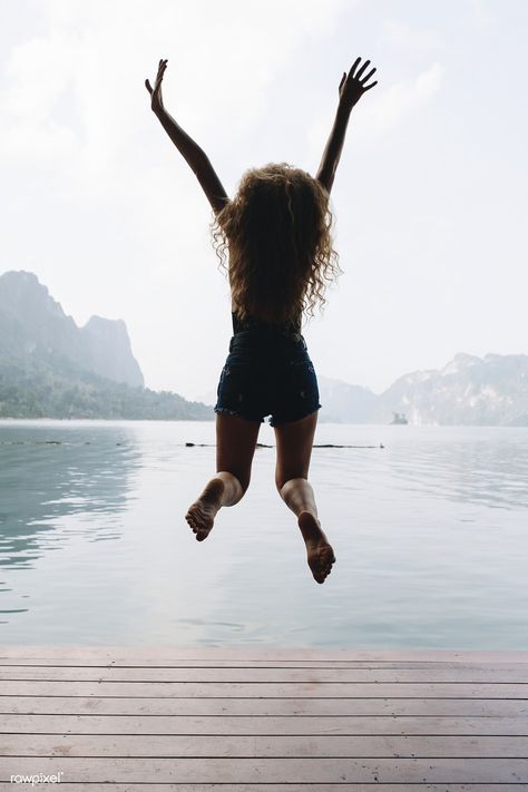 Happy woman jumping with joy | premium image by rawpixel.com Jumping Pictures, Woman Jumping, Jumping Poses, Freedom Girl, Person Photography, Zestaw Ikon, Island Adventure, New Year Pictures, Happy Photography