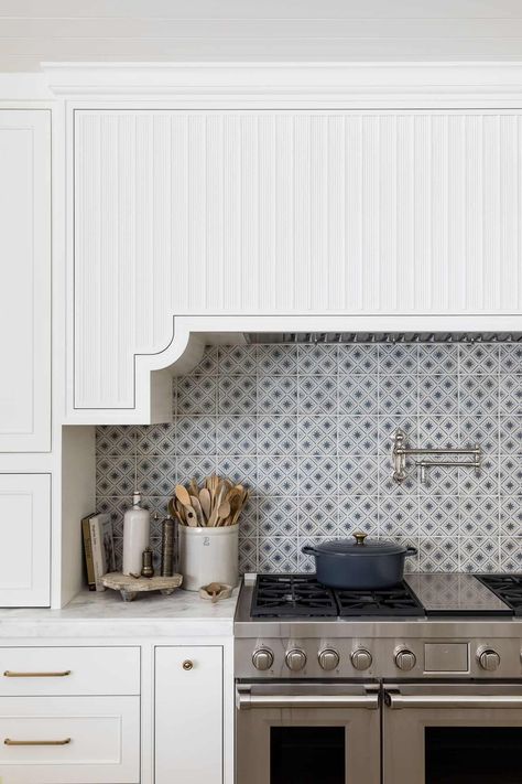 Our latest full-scale Nellie Gail kitchen remodel is live on the blog! The custom decorative hood above the range is the showcase of the space, further accented with a hand-painted terracotta tile backsplash. We love the bright and feminine design and decorative countertop slab detail. Decorative Hood, Mindy Gayer Design, Functional Kitchen Island, California Backyard, Countertop Slabs, Living Room Built Ins, Kitchen Remodel Inspiration, Backyard Remodel, Kitchen Hoods