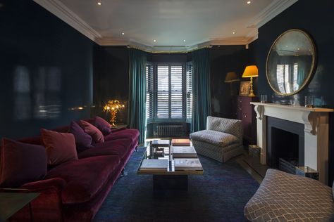 Rich colours and textures compliment traditional detailing of cornices and fireplaces to give this space a strong presence. The light control for the bay window via the shutters helps to build the ambience.  #living #home #ideas #style #decor #traditional #design #modern #fireplace #boudoir #dark #velvet #interior #rich #colour #light #ambience #sophisticated Hague Blue Living Room, Dark Moody Interior, Living Room Paint Colours, Nautical Theme Room, Burgundy Room, Crittall Doors, Hall Library, Klaus Haapaniemi, Ceiling Paint Colors