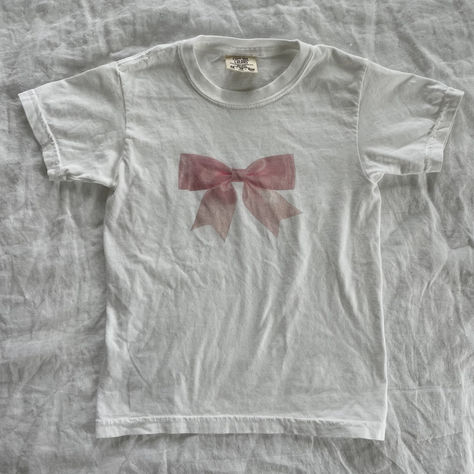 coquette baby tee bow t-shirt graphic t-shirt lana del rey coquette aesthetic pink aesthetic trending popular y2k 2000s feminine rage scandinavian style scandi aesthetic street style 2023 trend winter outfit Pink Coquette Shirt, Ytk Fashion, Lana Del Rey Coquette Aesthetic, Coquette T Shirt, Coquette Tshirt, Baby Tee Aesthetic, Scandi Aesthetic, Coquette Aesthetic Pink, Feminine Rage