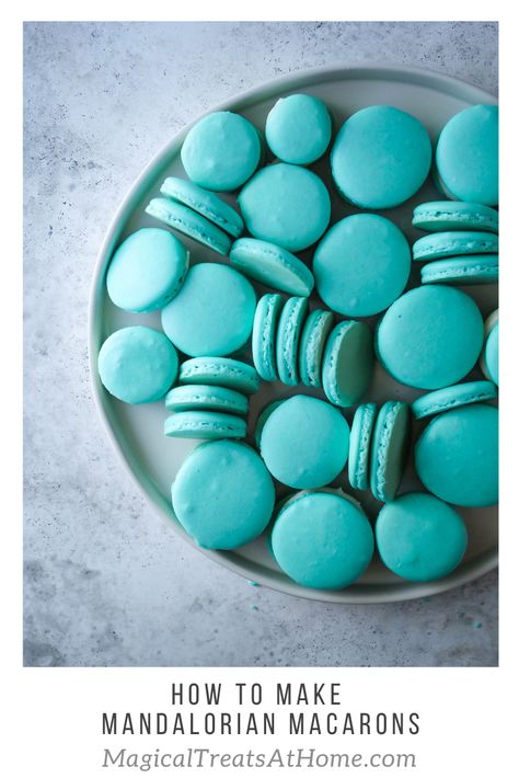 If you loved seeing Baby Yoda (AKA Grogu, the child, etc...) stealing and munching on a handful of beautiful blue macarons, well, now you can make your own with this no-fail, easy macaron recipe. Get the recipe today for these Mandalorian Macarons and enjoy them for #MandoMondays! // magicaltreatsathome.com #disneyeats #starwarsrecipes #macaronrecipe #BabyYoda #mandalorian #bluemacarons Mandalorian Food Ideas, Mandalorian Macarons, Mandalorian Party Decorations, Mandalorian Cake, Easy Macaron Recipe, Futuristic Food, Mandalorian Party, Mandalorian Birthday, Star Wars Dessert