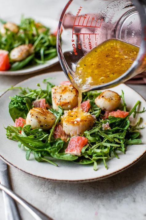 Seared scallops with pink grapefruit are wonderful over greens with a champagne vinaigrette as a light salad for lunch or dinner! #salad #scallops #dinner #seafood Salad With Grapefruit, Scallop Salad, Scallops Salad, Grapefruit Salad, Champagne Vinaigrette, Paleo Salads, Seared Scallops, French Dressing, Scallop Recipes