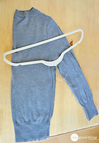 Fold Sweater On Hanger, How To Fold A Sweater Over A Hanger, Folding Sweaters On Hangers, Hanging Sweaters On Hangers, Sweater Folding Hacks, Folding Sweaters, Fold Sweaters, How To Fold Sweaters, Sweater Hangers