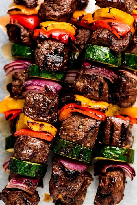 Steak Kabobs are an easy, healthy, and delicious entrée the whole family will love! Tender and juicy sirloin steak is marinated in a flavorful garlic marinade and threaded on skewers with crisp garden vegetables. Steak Kebabs In The Oven, Steak Kabob Marinade Recipes, Steak Skewer Recipes, Beef Skewers Marinade, Beef Kabobs On The Grill, Steak Kabobs On The Grill, Steak Kabob Marinade, Kabob Marinade Recipes, Kabobs On The Grill