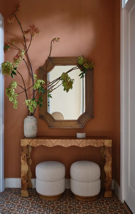 As we head into fall, opting for earthy tones are going to ensure your small entryway feels cozy and never poky. The warm terracotta shade is not only a warm and inviting color but since it feels like a neutral, can be accessorized throughout the year at minimal extra cost. (Image credit: Michael Clifford, design by Moksa Studio.) Yellow Foyer Entryway Paint Colors, Entry Wall Painting Ideas, Small Home Wall Colors, Small Entry Paint Colors, Corridor Color Walls, Pink Foyer Entryway, Entry Colors Paint, Entryway Wall Painting Ideas, Tiny Entry Way Ideas