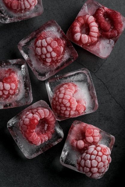 Photo fresh frozen in ice red raspberry ... | Premium Photo #Freepik #photo #frozen-fruit #blueberry-background #raspberry #red-fruits Frozen Fruit Photography, Fruit In Ice Cubes, Frozen Food Photography, Macro Fruit Photography, Raspberry Photography, Blueberry Background, Recycling Textiles, Frozen Photography, Fruit Blueberry