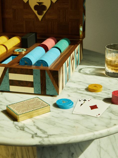 Inspired by design icon Gio Ponti, Alexandra Llewellyn’s walnut poker set is inlaid with delicate shapes in semi-precious turquoise and mother of pearl. Inside, four compartments conceal playing cards and clay poker chips. #luxurydesign #luxuryfurniture #glassware #tableware #games #gamesroom #wood #gamesnight #datenight #poker #pokerset #trending Wood Marquetry, Majolica Tiles, Poker Set, Backgammon Set, Gio Ponti, Design Icon, Poker Chips, Gift Finder, Marquetry