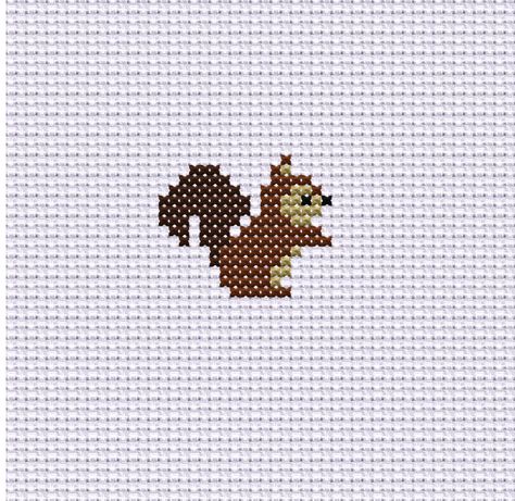 Little Baby Squirrel, Cross Stitch Pattern  Bring the charm of the forest into your home with this woodland-inspired design. Perfect for nurseries or any nature-lover's space, this cute animal cross stitch chart will add a touch of warmth and coziness. Once completed, this cross-stitch pattern can be framed and hung on the wall as a beautiful piece of art, or used to embellish a variety of items such as pillows, blankets, or tote bags. The possibilities are endless! Aida: 14 count ( 5,5 per cm) Cross Stitch Squirrel Pattern, Mini Cross Stitch Animals, Woodland Cross Stitch Pattern, Cross Stitch Simple Pattern, Minimalist Cross Stitch, Little Cross Stitch Patterns, Squirrel Pixel Art, Cute Cross Stitch Patterns Easy, Cross Stitch Small Pattern