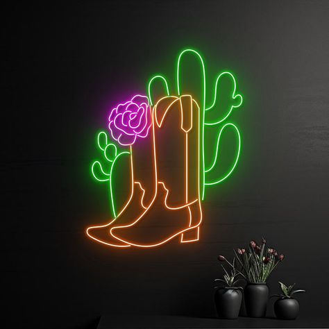 Cowboy Boots Cactus Neon Sign, Cactus Cowboy Boots Led Light, Cowgirl Boots Cactus Neon Light, Cactus Cowgirl Led Sign,Western Rose Led Sign Let us light up your life with quality LED neon signs for home, business, weddings, events, & more. Take a business logo, song lyrics, a kid's name, or even the shape of your dog, & neon-ify it! We are helping make art accessible with easy-to-design, stylish neon lights. Get creative and design your own neon sign. Your name, motto you live by, your business mission, or the motivational quote that you have always loved - choose anything and create customised neon signage. With the option of various fonts and colours, design a sign that reflects your personality.  MATERIALS+GUARANTEE Made from long lasting, durable and environmentally friendly LED neon Neon Cowboy Boots, Neon Cowgirl Aesthetic, Cowgirl Signs, Cactus Inspiration, Retro Western Aesthetic, Neon Cowboy, Pet Store Ideas, Neon Cactus, Southwestern Home Decor