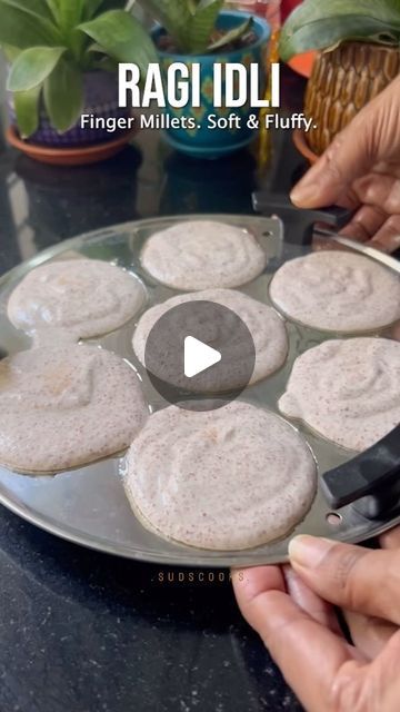 Sudha - Suds cooks on Instagram: "Ragi idli - another healthy idli recipe this time using Ragi/ Finger Millets Finger millet is an extremely nutritious cereal & contains about 5–8% protein, 1–2% ether extractives, 65–75% carbohydrates, 15–20% dietary fiber and 2.5–3.5% minerals.(As per vikaspedia) ✨ I grind the batter in 2 batches in the mixie. Ragi grains take a while to grind, don’t worry if your batter seems grainy, pause and grind some more until smooth. ✨ the batter should be free flowing like in the video, not too thick or too thin ✨ in hot weather the batter might ferment within 3-4 hours, and to double in volume so leave it in a large bowl to ferment ✨ you can also make dosa with this batter ✨ these idlis remain soft in the fridge too! Enjoy! idli, idli sambar, south indian bre Finger Millet Recipes, Millets Recipes Indian, Ragi Idli Recipe, Idli Batter Recipe, Ragi Recipes, Ragi Dosa, Idli Sambar, Dosa Batter, South Indian Breakfast