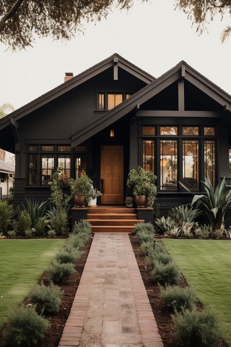 40+ Elegant Black Home Exterior Ideas Cool Architecture Design, Black Exterior Garage Doors, Moody Craftsman Exterior, Modern Cottage Homes Exterior, Black Craftsman House, Dark Exterior House Colors, Black Home Exterior, Home Exterior Ideas, Painting Brick