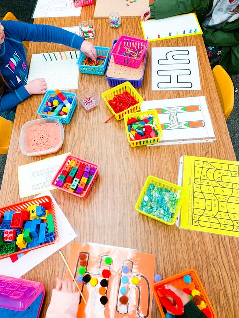 Here are our Monday activities for H Week! We built the letter in lots of different ways in our ever popular letter building center. We reviewed the letter on our Letter of the Week chart by singing our H Letter Formation Song, doing our H Action (hopping!), making the h sound, and reciting six different objects that start with H! Last, we practiced H on our Sky-Grass-Dirt paper with dry erase markers. ⁠⠀
This is such a GREAT way to kick off our letter study each week! Activities For Each Letter Of The Alphabet, Letter Of The Day Preschool, Letter Basket Ideas, Letter A Centers For Preschool, Letter Review For Preschool, Letter Centers Preschool, Letter Centers Kindergarten, Letter H Activities For Kindergarten, Letter Writing Center