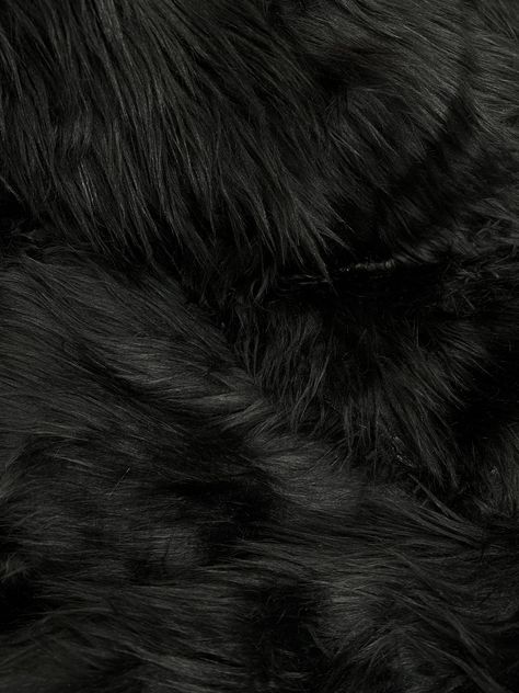 "Black luxury shag faux fur fabric by the yard, 60\" wide. Fabric is available in more colors. We do our best to ensure that our photos are as true to color as possible. However, due to inconsistencies monitors, digital photography and production variations, we cannot guarantee that the color you see on your screen accurately portrays the true color of the product. The finished product may be slightly different than it appears in the preview." Black Fabric Wallpaper, Black Fur Wallpaper, Fur Fabric Texture, Black Fur Aesthetic, Black Fabric Aesthetic, Black Material Texture, Black Fabric Texture, Black Things, Fur Fabric