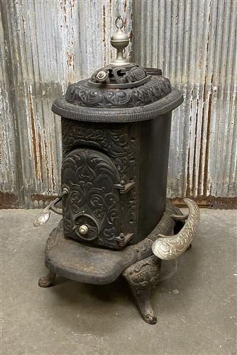 Can you feel the heat?   Featuring this vintage Gem City Stove Co. Cast Iron Stove from Quincy, IL!!  This stove measures approximately 29" wide, 44" tall and 32" deep.    Made by the Gem City Stove Company out of Quincy, IL.  Does show authentic age and wear from dirt, grime, and some rust inside and out. Refurbish this to use again in your shop, garage, barn, hunting cabin or man cave!  Please examine the photos carefully before puchasing as they are a part of this description.  Please be advised that this will be freight delivery to the Continental United States. Freight shipping is not the same as ground.  Residential shipping is curbside, they do not bring the item inside. We will need a contact phone number we can give the freight company.   Instagram: theoldgrainery Facebook: The Ol Antique Cast Iron Stove, Antique Kitchen Stoves, Parlour Stove, Wood Burning Heaters, Cast Iron Stove, Hunting Cabin, Kitchen Stove, Antique Kitchen, Large Appliances