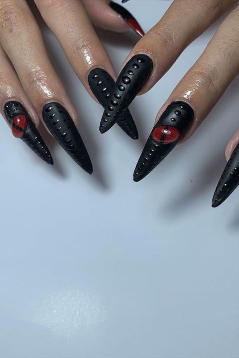 Unleash the mystique with a black nail set by @streetnail.art featuring a mesmerizing 3D red dragon’s eye, coupled with intricate dragon skin texture, for a captivating and fierce manicure. Craving a nail makeover? Your journey begins at nailustrous.com! Dive into our article for a wealth of captivating nail art ideas and transform your nails into works of art! Black Dragon Nails, Black 3d Nails, Dragon Skin Texture, Nail Makeover, Dragon Nails, 3d Nail Designs, Dragon Skin, Black Nail, Press Ons