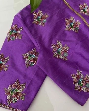 Discover elegance in every stitch with our Designer Purple Maggam Work Blouse, meticulously crafted to perfection. This stunning piece features intricate maggam work on premium Half Pattu fabric, ensuring a regal look for any special occasion. Available in unstitched at ₹2500 and stitched at ₹3050, this blouse can be fully customized in terms of color and size to match your unique style. Reach us 96404 90158 for enquires and bookings #PurpleMaggamBlouse #DesignerBlouses #HandcraftedElega... Purple Maggam Work Blouse Designs, Purple Aari Work Blouse, Unique Aari Work Blouse Designs, Purple Maggam Work Blouse, Maggam Work Blouse Designs Latest For Pattu Sarees, Maggam Work Blouse Designs Latest, Work Blouse Designs Latest, Work Blouse Designs, Maggam Work Blouse