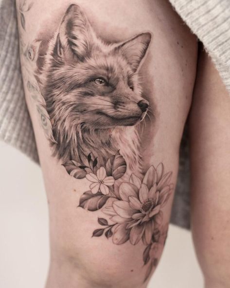 28 Fox Tattoo Ideas For Your Curious And Cunning Spirit Flowers Thigh Tattoo, Fox Tattoo Ideas, Small Fox Tattoo, Red Fox Tattoos, Fox And Flowers, Animal Mandala, Fox Tattoo Design, Animal Sleeve Tattoo, Our Mindful Life