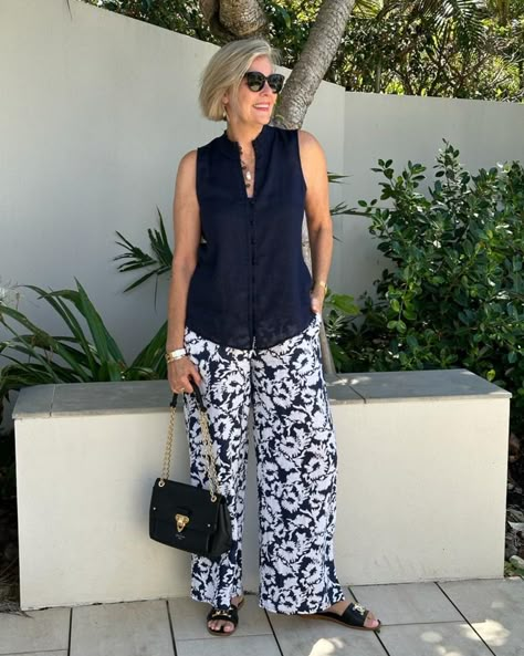 Shop French Linen High Neck Racer and other curated products on LTK, the easiest way to shop everything from your favorite creators. Capri Outfits, Stylish Outfits For Women Over 50, Trouser Suit, Over 60 Fashion, Floral Print Pants, Cool Summer Outfits, Pants Outfits, 60 Fashion, Bohemian Floral