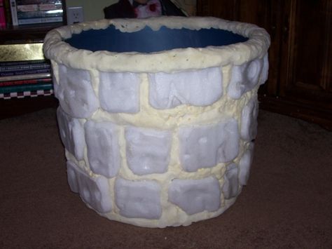 ... I decided to work on a faux well for a Samara/The Ring static prop for '08. I used a large round storage container from Wal-Mart as the supporting structure, I made the stones from styrofoam and filled in the gaps with great stuff and carved it down. Here's what I have so far...I still have to add a layer of monster mud, paint the stones and build the armature for Samara. Halloween Well Prop, Samara The Ring, Foam Projects, Egypt Vbs, Monster Mud, Weird Animals Vbs, Mud Paint, Larp Props, Props Ideas