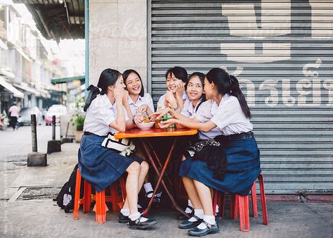 Thai high school student sitting at street restaurant in Bangkok by Nabi Tang High School Students In Uniform, High School Photoshoot, Student Photoshoot, Thai Photography, Students Photography, School Reference, Yearbook Photoshoot, Street Restaurant, High School Photography