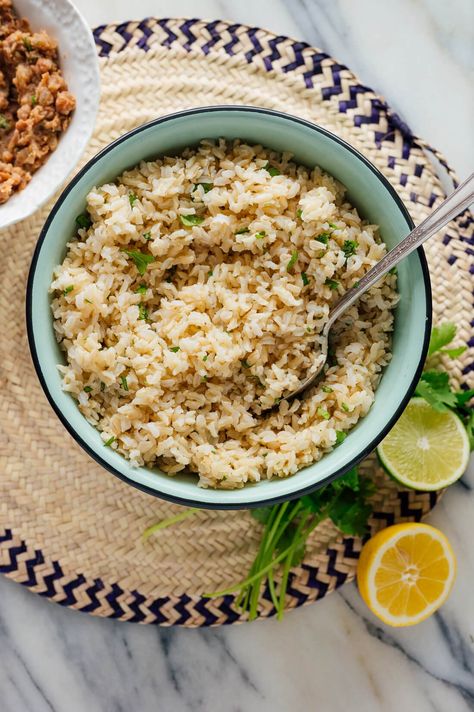 This cilantro lime brown rice tastes just like Chipotle's! It's a staple in my kitchen. #brownrice #cilantrolimerice #wholegrains #mexicanrecipe #cookieandkate Lime Brown Rice, Cilantro Lime Brown Rice, Healthy Brown Rice, Rice Cookies, Sweet Potato Seasoning, Brown Rice Recipe, Brown Rice Recipes, Lime Rice, Cilantro Lime Rice