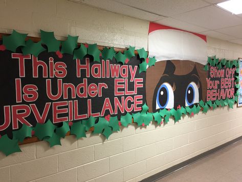 This Hallway Is Under Elf Surveillance, Elf Surveillance Bulletin Board, Elf School Decorations, Elf Bulletin Board Ideas For School, School Hall Christmas Decorations, Elf Hallway Decorations School, Christmas Themed Bulletin Boards, Elf On The Shelf Bulletin Board Ideas, Hallway Decorating School