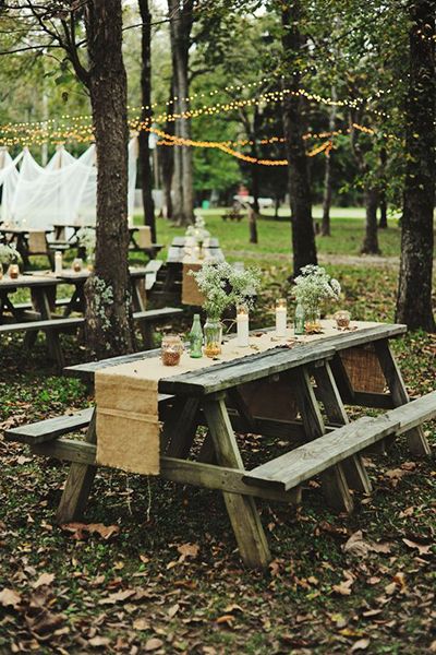 Getting married in a park? A simple runner over a picnic table elevates it to wedding-ready. Picnic Table Wedding, Wedding Picnic Reception, Picnic Table Decor, Wedding Reception On A Budget, Outdoor Picnic Table, Wedding Reception Layout, Campground Wedding, Reception Layout, Picnic Style