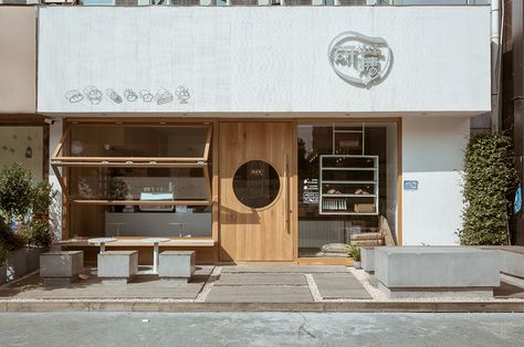 RE x SUGAR Bakery Shop Serves up Japanese Treats and a Minimalist Design - Metropolis Folding Windows, Square Windows, Cafe Shop Design, Small Cafe, Bakery Design, Coffee Shop Design, Bakery Shop, Cafe Interior Design, Nanjing