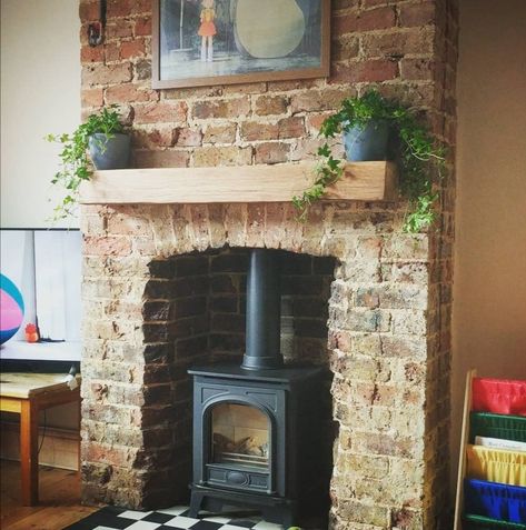 Exposed Wood Fireplace, Wood Burner Brick Fireplace, Cottage Stove Fireplace, Bare Brick Fireplace, Brick And Metal Fireplace, Light Red Brick Fireplace, Real Brick Fireplace, Log Burner Cottage, Brick Mantel Fireplace