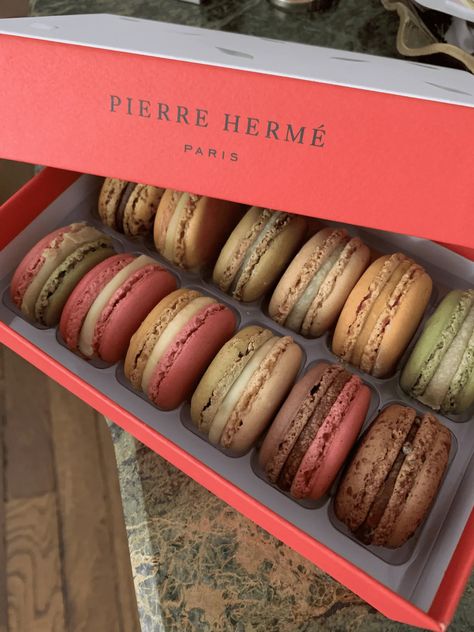 Pierre Herme Macarons from Paris, What are unique Parisian Souvenirs, if you are traveling to Paris you'll want to pick up some souvenirs. Discover the best souvenirs from Paris, Paris souvenirs, unique Souvenirs from Paris, memorable souvenirs to purchase in Paris, what to buy in Paris, what to bring home from Paris, should i leave room in my suitcase for souvenirs in Paris Paris Souvenirs Gift, Pierre Herme Paris, Pierre Herme Macarons, What To Buy In Paris, Souvenirs From Paris, France Souvenirs, Macarons Paris, Traveling To Paris, French Souvenirs