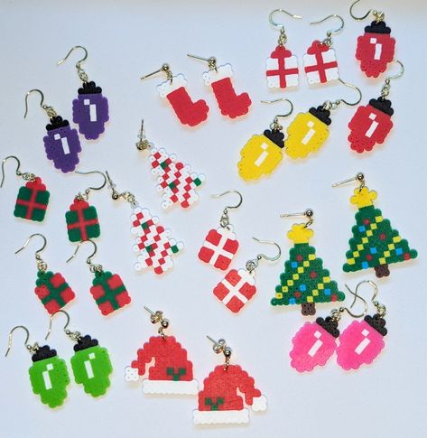 Get ready for the holidays with these cute and festive earrings. Made of mini perler beads fused together to create these beautiful earrings. They are light weight and super comfortable to wear all day or night. Melted Bead Earrings Diy, Stand Up Perler Bead Patterns, Perler Bead Christmas Earrings, Peeler Bead Earring Ideas, Perler Earrings Diy, Thanksgiving Perler Beads, Christmas Perler Bead Earrings, Perleplader Ideas Diy, Perler Christmas Earrings