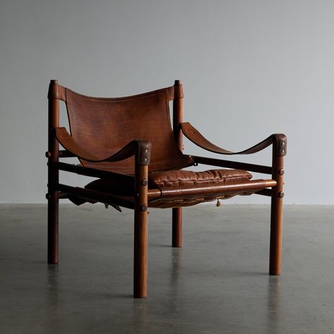 Listed on VNTG.com: Arne Norell 'Sirocco' safari chair in Cognac Leather, Sweden 1960's | #vntg #vintage Safari Furniture, Workers Cottage, Arne Norell, Vintage Leather Chairs, Leather Chair Living Room, Antique Vintage Decor, Vintage Safari, Safari Chair, Door Security