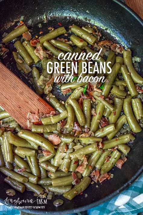 Canned green beans don't have to be boring! Add onions and bacon to kick up this pantry staple a few notches. This is a family favorite!! #greenbeans #bacon #onions #greenbeanswithbacon #cannedgreenbeans #cannedgreenbeaswithbacon #baconrecipes #sidedish #onionsandbacon #sautedveggies #sidedish Bacon Onion Green Beans, Green Beans Onions And Bacon, Easy Green Beans With Bacon, Canned Green Bean Recipes With Bacon, Keto Canned Green Bean Recipes, Southern Green Beans Canned, Green Beans With Bacon And Onion, Can Green Beans With Bacon, Sauteed Canned Green Beans