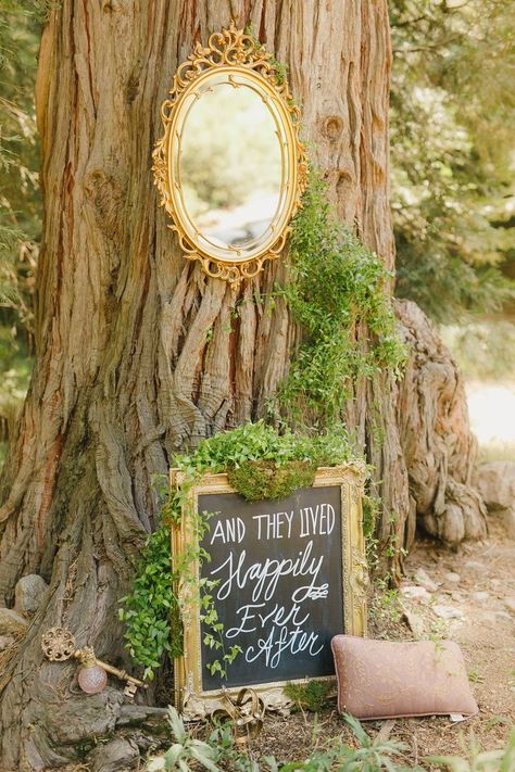 Disney fairytale wedding inspiration. "And they lived happily ever after" written on a gold ornate frame.  #fairytalewedding #happilyeverafter #weddinginspiration Fairy Wedding Theme, Enchanted Wedding Decor, Shrek Wedding, Princess Wedding Theme, Sleeping Beauty Wedding, Fairytale Wedding Theme, Cottagecore Wedding, Forest Theme Wedding, Storybook Wedding