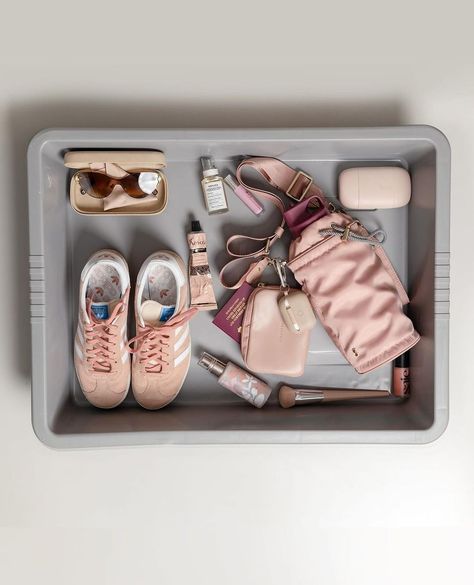 Influencers are doing photo shoots with their airport security trays in a new online trend that has people angry about holdups in the line. Here’s what it’s all about. Airport Tray, Things Organized Neatly, Summer Packing, Airport Security, Summer Aesthetic, Studio Photography, This Summer, Chloe, Tray