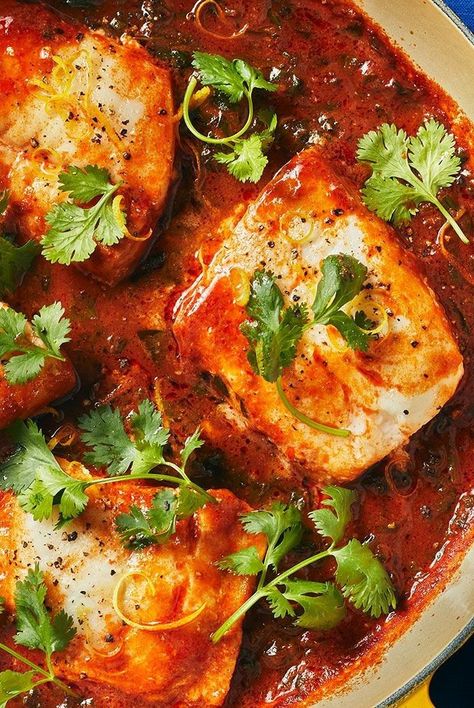 This simple braised fish dish combines a spiced tomato sauce with spinach, cod, and couscous. Get the recipe for Braised Fish With Spicy Tomato Sauce. Fish Tomato Recipe, Spicy Cod Recipes, Tomato Fish Recipe, Fish With Tomato Sauce, Fish In Tomato Sauce Recipe, Braised Fish Recipe, Fish In Tomato Sauce, Italian Fish Stew, Braised Fish