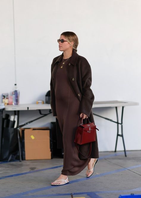 See all of Sofia Richie’s chic maternity looks ahead of welcoming her baby girl Sofia Richie Maternity Style, Arielle Charnas Pregnancy Style, French Maternity Style Winter, Stylish Pregnant Outfits, Pregnancy Capsule Wardrobe Fall Winter, Dressy Maternity Outfits For Winter, Bau Outfits, Jeanne Damas Pregnant, Cool Girl Pregnancy Style