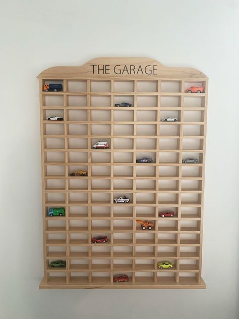 Car Wall Storage, Matchbox Car Display Ideas, Car Toys Storage Ideas, Toy Room Car Storage, Hotwheel Storage Ideas, Toy Car Wall Storage, Diy Matchbox Car Storage, Hot Wheel Car Storage, Matchbox Car Display