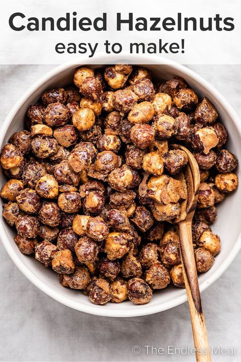 Add these simple candied hazelnuts to salads, treats, and savory dishes for a sweet and nutty crunch. They're easy to make and they're ready in 40 minutes! #theendlessmeal #candiedhazlnuts #hazelnuts #candiednuts #christmas #diy #nuts Roasted Hazelnut Recipes Savory, What To Do With Hazelnuts Recipe, Fresh Hazelnut Recipes, Hazel Nuts Recipes, Hazel Nut Recipes Food, Hazelnut Recipes Healthy, Hazelnut Recipes Savory, Recipes With Hazelnuts Easy, Candied Hazelnuts Recipe